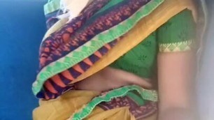 Aunty showing navel and boobs